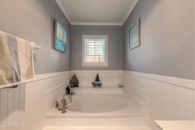 Live every day like it's a beach day in this beautifully on Oceans Golf Club in Florida - for sale on GolfHomes.com, golf home, golf lot