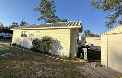 This cute 1 bedroom 1 bath park model with 10x14 bonus room is on Clerbrook Resort, Inc. in Florida - for sale on GolfHomes.com, golf home, golf lot