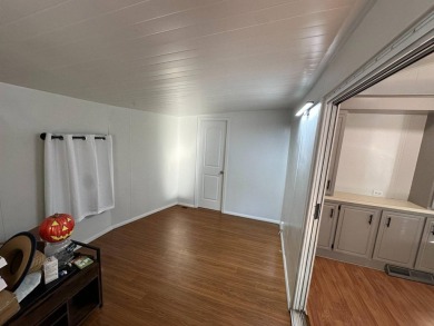 This cute 1 bedroom 1 bath park model with 10x14 bonus room is on Clerbrook Resort, Inc. in Florida - for sale on GolfHomes.com, golf home, golf lot