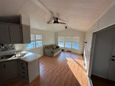 This cute 1 bedroom 1 bath park model with 10x14 bonus room is on Clerbrook Resort, Inc. in Florida - for sale on GolfHomes.com, golf home, golf lot