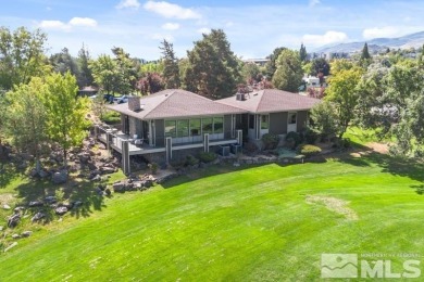 Stunning private one-story home on the 5th hole of the Lakeridge on LakeRidge Golf Course in Nevada - for sale on GolfHomes.com, golf home, golf lot