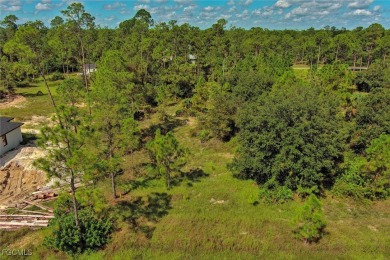 Exclusively listed by Sunland Real Estate: This prime 0.50-acre on Lehigh Resort Club in Florida - for sale on GolfHomes.com, golf home, golf lot