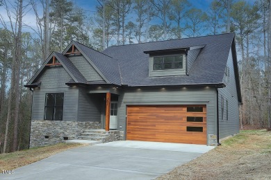 Beautifully custom designed ranch style home with 3 bedrooms on on River Golf and County Club at Lake Royale in North Carolina - for sale on GolfHomes.com, golf home, golf lot