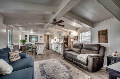 Situated on an oversized lot, this clean, bright, and move-in on Barefoot Resort and Golf Club  in South Carolina - for sale on GolfHomes.com, golf home, golf lot