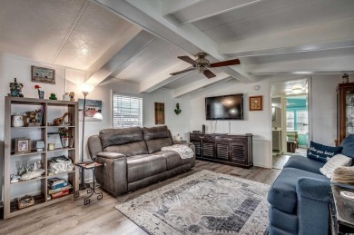 Situated on an oversized lot, this clean, bright, and move-in on Barefoot Resort and Golf Club  in South Carolina - for sale on GolfHomes.com, golf home, golf lot