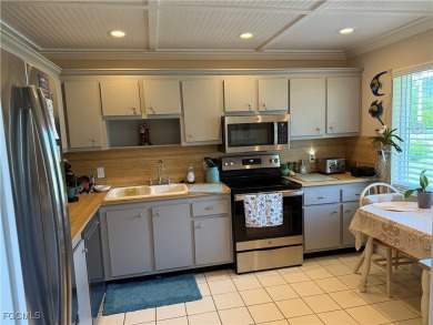 Discover the perfect blend of comfort and resort-style living in on The Glades Golf and Country Club in Florida - for sale on GolfHomes.com, golf home, golf lot