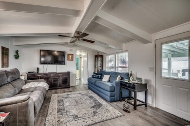 Situated on an oversized lot, this clean, bright, and move-in on Barefoot Resort and Golf Club  in South Carolina - for sale on GolfHomes.com, golf home, golf lot