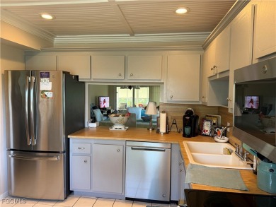 Discover the perfect blend of comfort and resort-style living in on The Glades Golf and Country Club in Florida - for sale on GolfHomes.com, golf home, golf lot