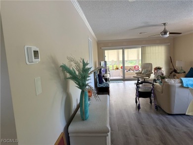 Discover the perfect blend of comfort and resort-style living in on The Glades Golf and Country Club in Florida - for sale on GolfHomes.com, golf home, golf lot