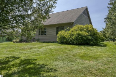 Enjoy main floor living! With this  3-bedroom, 2-bath home on Grand Traverse Resort and Spa in Michigan - for sale on GolfHomes.com, golf home, golf lot