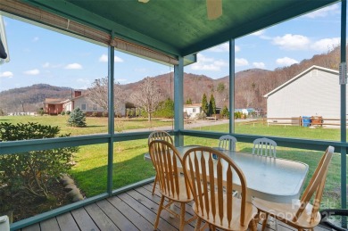 Soak up the mountains in this move-in ready home. With easy on Maggie Valley Resort and Country Club in North Carolina - for sale on GolfHomes.com, golf home, golf lot