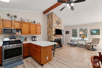 Soak up the mountains in this move-in ready home. With easy on Maggie Valley Resort and Country Club in North Carolina - for sale on GolfHomes.com, golf home, golf lot