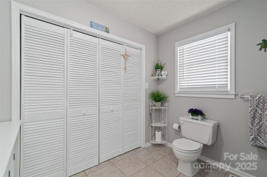 Soak up the mountains in this move-in ready home. With easy on Maggie Valley Resort and Country Club in North Carolina - for sale on GolfHomes.com, golf home, golf lot