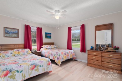 Soak up the mountains in this move-in ready home. With easy on Maggie Valley Resort and Country Club in North Carolina - for sale on GolfHomes.com, golf home, golf lot