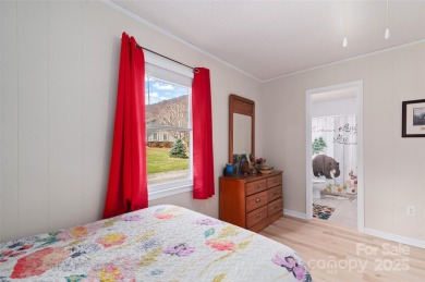 Soak up the mountains in this move-in ready home. With easy on Maggie Valley Resort and Country Club in North Carolina - for sale on GolfHomes.com, golf home, golf lot