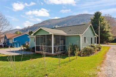 Soak up the mountains in this move-in ready home. With easy on Maggie Valley Resort and Country Club in North Carolina - for sale on GolfHomes.com, golf home, golf lot