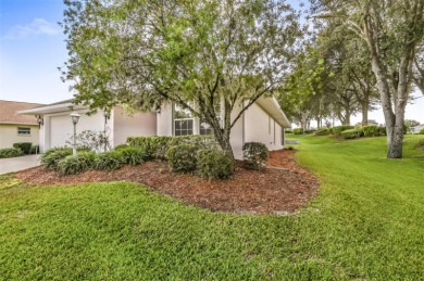 This well-maintained 2 bedroom/2 bathroom/den/2 car garage home on Twisted Oaks Golf Club in Florida - for sale on GolfHomes.com, golf home, golf lot