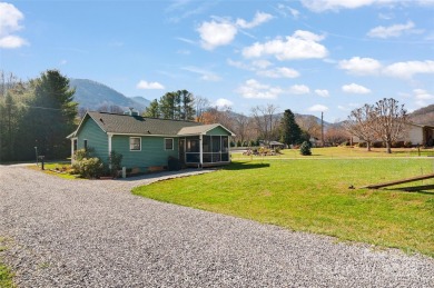 Soak up the mountains in this move-in ready home. With easy on Maggie Valley Resort and Country Club in North Carolina - for sale on GolfHomes.com, golf home, golf lot
