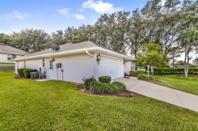 This well-maintained 2 bedroom/2 bathroom/den/2 car garage home on Twisted Oaks Golf Club in Florida - for sale on GolfHomes.com, golf home, golf lot
