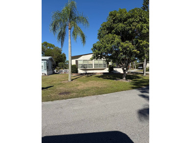 This lovely, manufactured home is on leased land in Lake on Pine Lakes Country Club in Florida - for sale on GolfHomes.com, golf home, golf lot