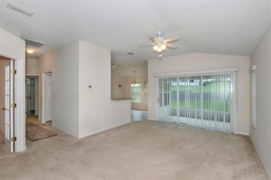 This well-maintained 2 bedroom/2 bathroom/den/2 car garage home on Twisted Oaks Golf Club in Florida - for sale on GolfHomes.com, golf home, golf lot