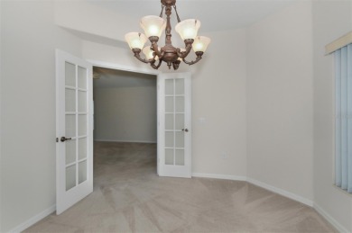 This well-maintained 2 bedroom/2 bathroom/den/2 car garage home on Twisted Oaks Golf Club in Florida - for sale on GolfHomes.com, golf home, golf lot