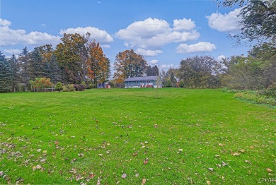 Discover the perfect blend of convenience and privacy in this on Heron Creek Golf Club in New York - for sale on GolfHomes.com, golf home, golf lot