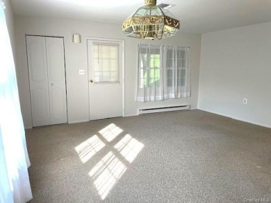 Charming Eton Model Condo in Leisure Village - a premier 55+ on Leisure Village Golf Course in New York - for sale on GolfHomes.com, golf home, golf lot