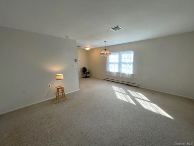 Charming Eton Model Condo in Leisure Village - a premier 55+ on Leisure Village Golf Course in New York - for sale on GolfHomes.com, golf home, golf lot