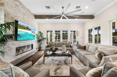 Step into luxury with this beautifully renovated waterfront home on Miromar Lakes Golf Club in Florida - for sale on GolfHomes.com, golf home, golf lot