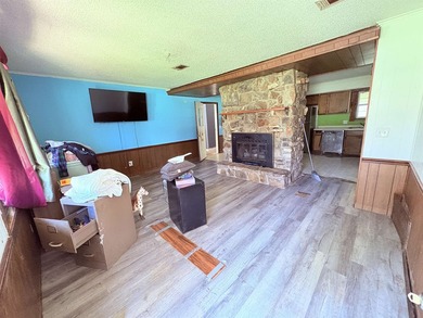 4-bedroom, 3-bath home on approximately 0.69 acres with a wet on Cherokee Village North Course in Arkansas - for sale on GolfHomes.com, golf home, golf lot