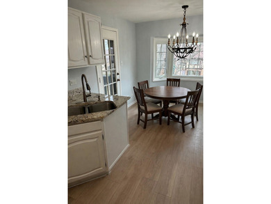 Welcome to this spacious and inviting 3-bedroom, 2-bath on Oak Hills Country Club in Illinois - for sale on GolfHomes.com, golf home, golf lot