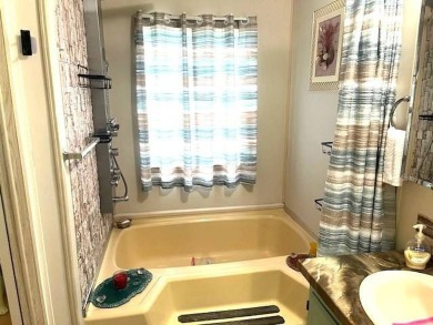 Welcome to your perfect seasonal escape! This 2-bedroom on Crystal Lake Club in Florida - for sale on GolfHomes.com, golf home, golf lot
