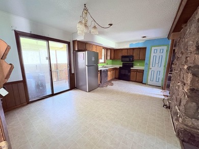 4-bedroom, 3-bath home on approximately 0.69 acres with a wet on Cherokee Village North Course in Arkansas - for sale on GolfHomes.com, golf home, golf lot