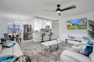 You will fall in love with this COMPLETELY RENOVATED AND on Kings Point Golf -Flanders Way in Florida - for sale on GolfHomes.com, golf home, golf lot