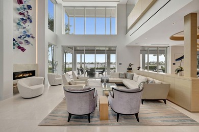 Experience the best of luxury living in this waterfront coastal on Sailfish Point Golf Club, Inc. in Florida - for sale on GolfHomes.com, golf home, golf lot
