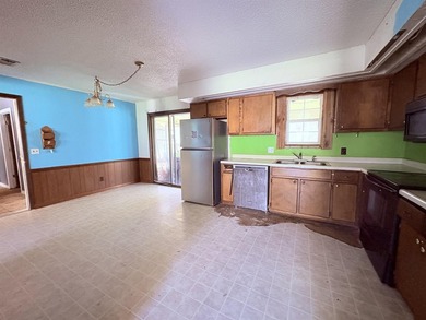 4-bedroom, 3-bath home on approximately 0.69 acres with a wet on Cherokee Village North Course in Arkansas - for sale on GolfHomes.com, golf home, golf lot