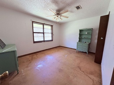 4-bedroom, 3-bath home on approximately 0.69 acres with a wet on Cherokee Village North Course in Arkansas - for sale on GolfHomes.com, golf home, golf lot