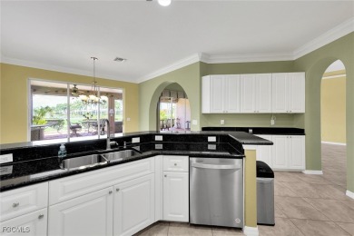 Golf Course Living with Scenic Lake Views. This exceptional on The Golf Club At Magnolia Landing in Florida - for sale on GolfHomes.com, golf home, golf lot