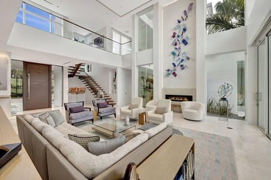 Experience the best of luxury living in this waterfront coastal on Sailfish Point Golf Club, Inc. in Florida - for sale on GolfHomes.com, golf home, golf lot