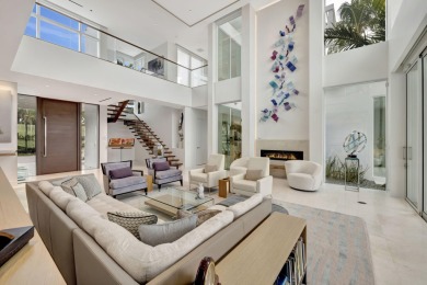 Experience the best of luxury living in this waterfront coastal on Sailfish Point Golf Club, Inc. in Florida - for sale on GolfHomes.com, golf home, golf lot