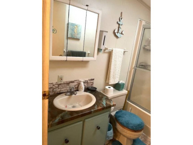 Welcome to your perfect seasonal escape! This 2-bedroom on Crystal Lake Club in Florida - for sale on GolfHomes.com, golf home, golf lot