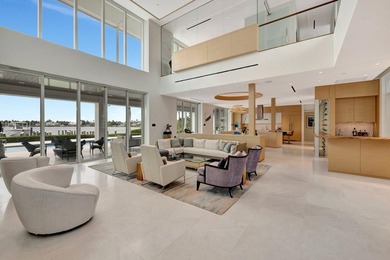 Experience the best of luxury living in this waterfront coastal on Sailfish Point Golf Club, Inc. in Florida - for sale on GolfHomes.com, golf home, golf lot