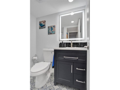 You will fall in love with this COMPLETELY RENOVATED AND on Kings Point Golf -Flanders Way in Florida - for sale on GolfHomes.com, golf home, golf lot