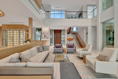 Experience the best of luxury living in this waterfront coastal on Sailfish Point Golf Club, Inc. in Florida - for sale on GolfHomes.com, golf home, golf lot