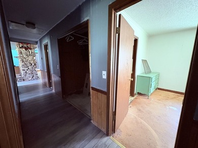 4-bedroom, 3-bath home on approximately 0.69 acres with a wet on Cherokee Village North Course in Arkansas - for sale on GolfHomes.com, golf home, golf lot