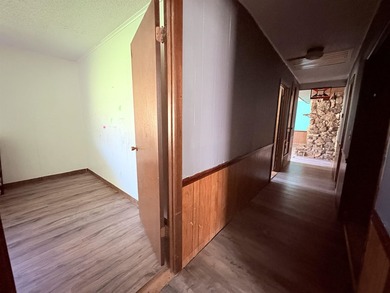 4-bedroom, 3-bath home on approximately 0.69 acres with a wet on Cherokee Village North Course in Arkansas - for sale on GolfHomes.com, golf home, golf lot