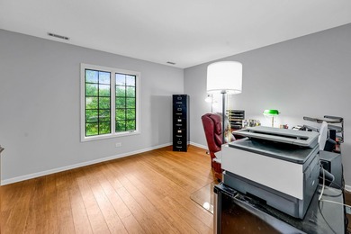 Welcome to this spacious and inviting 3-bedroom, 2-bath on Oak Hills Country Club in Illinois - for sale on GolfHomes.com, golf home, golf lot