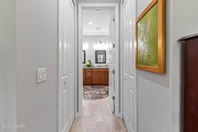 Welcome to Perfection in Paradise! This amazing Parrot model is on LPGA International Golf Course in Florida - for sale on GolfHomes.com, golf home, golf lot