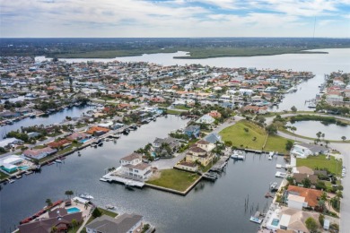 SPECTACULAR MILLION DOLLAR 360 VIEW OF WIDE OPEN WATERS, SUNSETS on Gulf Harbors Golf Course in Florida - for sale on GolfHomes.com, golf home, golf lot